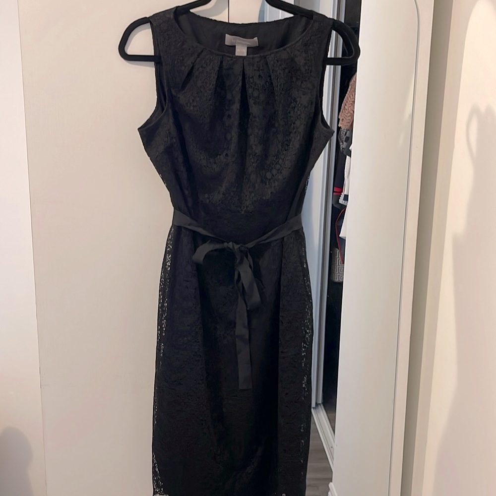 A beautiful black lace sleeveless dress